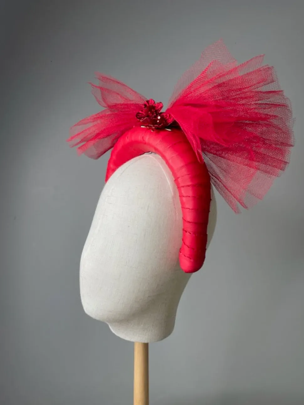 melanie_ferrero__red_leat_0.webp Melanie Ferrero - Red Leather band with bow