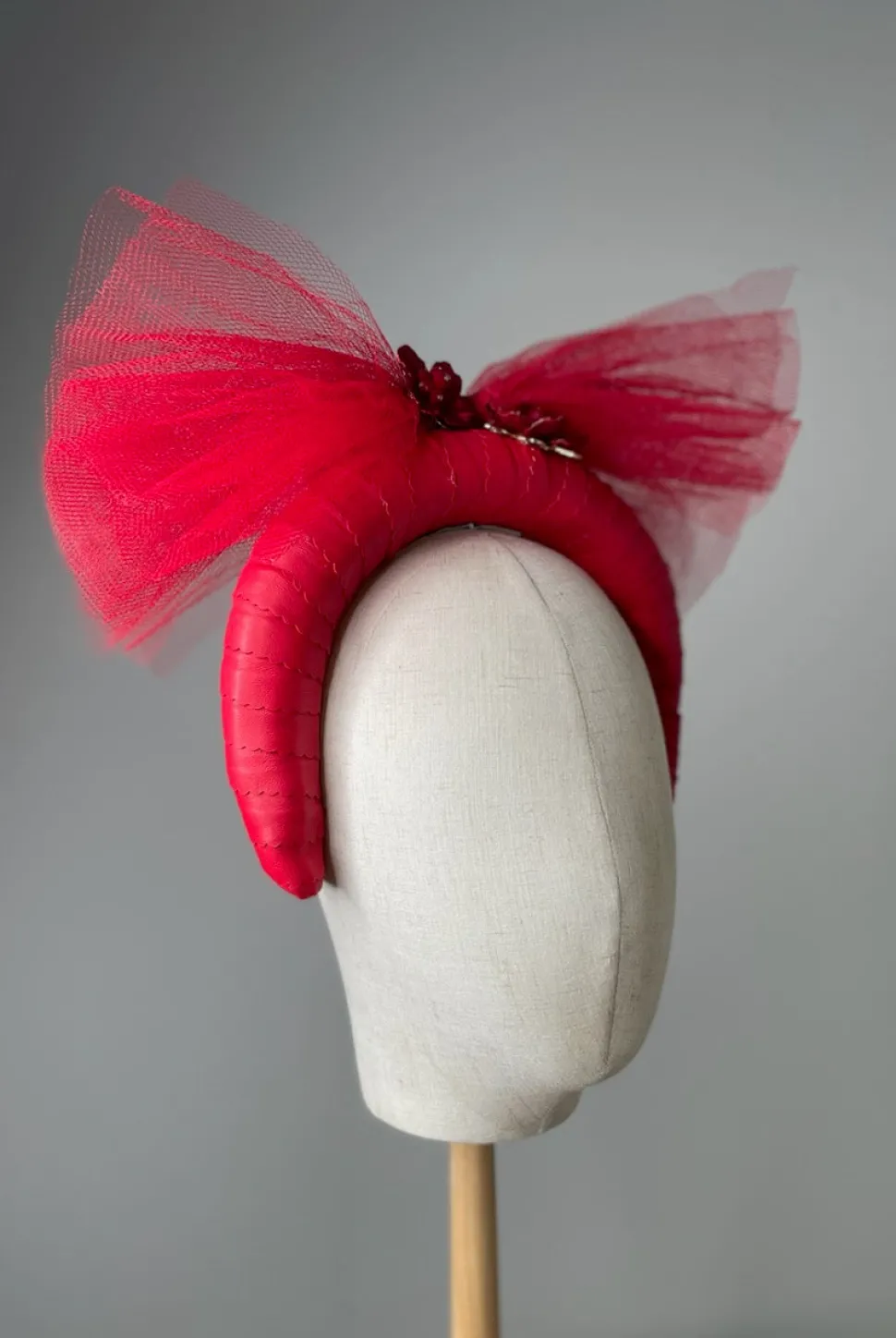 melanie_ferrero__red_leat_3.webp Melanie Ferrero - Red Leather band with bow